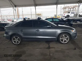 2015 Audi A3 Premium z VIN WAUACGFF3F1073735, wystawiony jako IAAI lot #42184594 z przebiegiem 104 906 mil mil oraz . Historia ofert i sprzedaży dostępna na DreamBid. Obrazek 13.