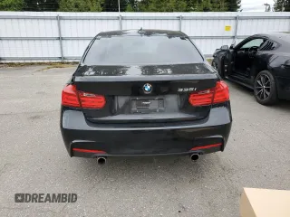 2014 BMW 3 Series 335i with VIN WBA3A9C5XEF477543, listed as a Copart auction lot 54410795 with 67,237 mi miles and Salvage Title. Bid and sale history available at carsss.com. Image 6.