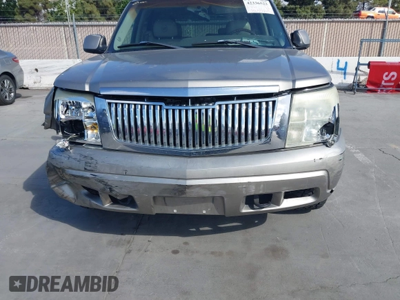2003 Cadillac Escalade z VIN 1GYEK63N03R155894, wystawiony jako IAAI lot #42336523 z przebiegiem 188 332 mil mil oraz . Historia ofert i sprzedaży dostępna na DreamBid. Obrazek 6.