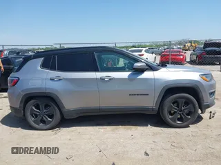 2018 Jeep Compass Latitude with VIN 3C4NJDBB3JT304145, listed as a IAAI auction lot 42008241 with 52,642 mi miles and . Bid and sale history available at DreamBid. Image 13.