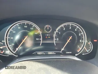 2016 BMW 7 Series 750i with VIN WBA7F0C58GGM20723, listed as a Copart auction lot 80143764 with 102,311 mi miles and Salvage Title. Bid and sale history available at carsss.com. Image 9.