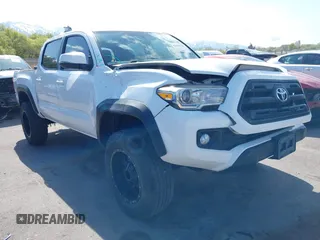 2016 Toyota Tacoma SR with VIN 3TMCZ5AN4GM023573, listed as a IAAI auction lot 42056720 with 132,607 mi miles and . Bid and sale history available at DreamBid. Image 1.