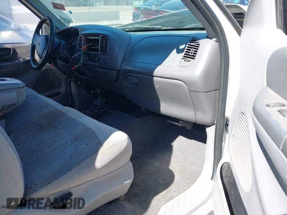 1999 Ford F-150 XL с VIN 1FTRX18L0XKB29703, выставлен на аукционе IAAI как лот 41644163 с пробегом Не указан миль и . История ставок и продаж доступна на DreamBid. Изображение 5.
