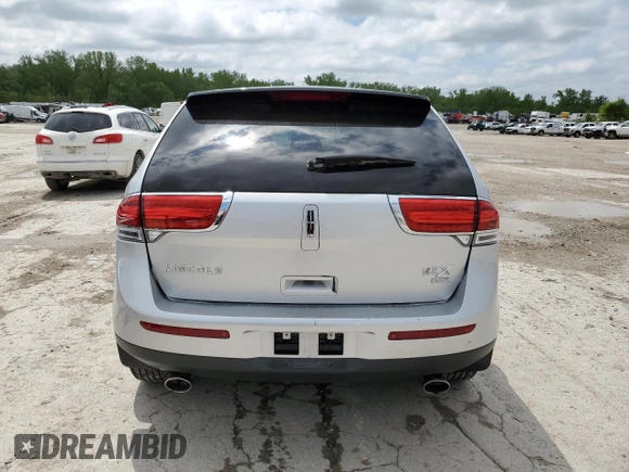 2011 Lincoln MKX z VIN 2LMDJ8JK6BBJ08962, wystawiony jako Copart lot #54329225 z przebiegiem 183 883 mil mil oraz Szkoda całkowita • Salvage title. Historia ofert i sprzedaży dostępna na DreamBid. Obrazek 6.