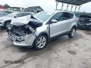 2013 Ford Escape SEL z VIN 1FMCU9H97DUA34665, wystawiony jako IAAI lot #42258567 z przebiegiem 174 227 mil mil oraz . Historia ofert i sprzedaży dostępna na DreamBid. Obrazek 19.