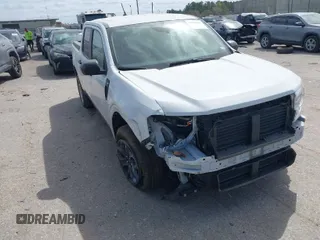 2023 Ford Maverick XL with VIN 3FTTW8E96PRA74020, listed as a IAAI auction lot 41782011 with 30,592 mi miles and . Bid and sale history available at DreamBid. Image 1.