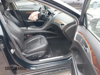 2014 Lincoln MKZ with VIN 3LN6L2G97ER804381, listed as a IAAI auction lot 42277543 with 120,907 mi miles and . Bid and sale history available at DreamBid. Image 5.