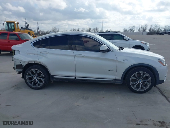 2015 BMW X4 xDrive28i with VIN 5UXXW3C53F0M88714, listed as a IAAI auction lot 41483692 with 132,054 mi miles. Bid and sale history available at carsss.com. Image 13.
