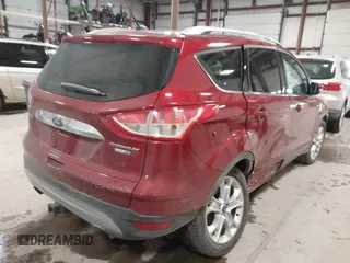 2014 Ford Escape Titanium with VIN 1FMCU9J9XEUA51732, listed as a IAAI auction lot 41542867 with 44,141 mi miles. Bid and sale history available at carsss.com. Image 4.