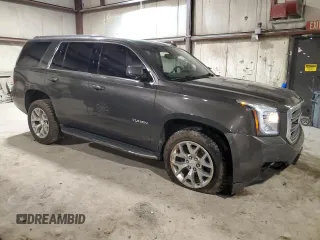 2020 GMC Yukon SLT Standard Edition with VIN 1GKS2DKC5LR286112, listed as a Copart auction lot 82692994 with 87,959 mi miles and Salvage Title. Bid and sale history available at carsss.com. Image 4.