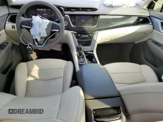 2021 Cadillac XT6 Premium Luxury z VIN 1GYKPCRS6MZ205831, wystawiony jako Copart lot #47259215 z przebiegiem 31 959 mil mil oraz Szkody całkowita. Historia ofert i sprzedaży dostępna na DreamBid. Obrazek 8.