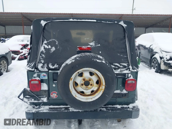 2004 Jeep Wrangler SE with VIN 1J4FA29154P778915, listed as a IAAI auction lot 41245325 with 205,852 mi miles and . Bid and sale history available at DreamBid. Image 16.