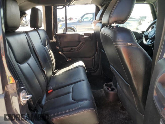 2017 Jeep Wrangler Unlimited 75th Anniversary with VIN 1C4HJWEGXHL546436, listed as a Copart auction lot 48229875 with 107,222 mi miles and Salvage title. Bid and sale history available at DreamBid. Image 11.