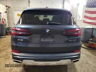 2021 BMW X5 xDrive40i with VIN 5UXCR6C06M9E05140, listed as a Copart auction lot 52402475 with 47,869 mi miles and Salvage title. Bid and sale history available at DreamBid. Image 6.