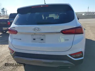 2019 Hyundai Santa Fe SE with VIN 5NMS2CAD5KH011357, listed as a IAAI auction lot 40918980 with 98,851 mi miles. Bid and sale history available at carsss.com. Image 16.
