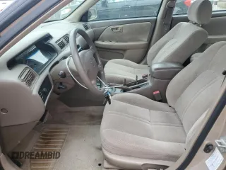 2001 Toyota Camry CE z VIN 4T1BG22K41U104477, wystawiony jako Copart lot #58437155 z przebiegiem 84 355 mil mil oraz Czysty tytuł • Clean title. Historia ofert i sprzedaży dostępna na DreamBid. Obrazek 7.