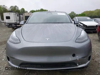 2024 Tesla Model Y Performance with VIN 7SAYGDEF2RA322351, listed as a IAAI auction lot 41953896 with 8,959 mi miles and . Bid and sale history available at carsss.com. Image 11.