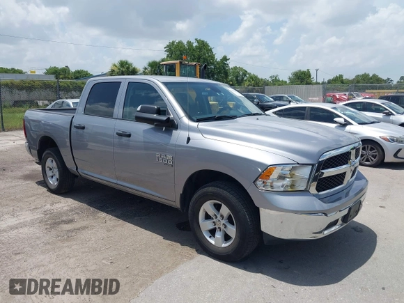 2023 Ram 1500 SLT z VIN 1C6RR7LG0PS517769, wystawiony jako IAAI lot #42451307 z przebiegiem 49 931 mil mil oraz . Historia ofert i sprzedaży dostępna na DreamBid. Obrazek 1.