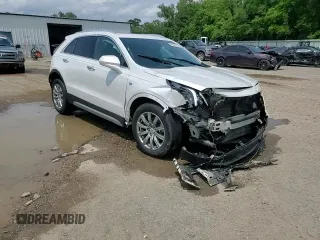 2019 Cadillac XT4 FWD Premium Luxury с VIN 1GYFZCR41KF127888, выставлен на аукционе Copart как лот 55027135 с пробегом 111 057 миль миль и Списание • Salvage title. История ставок и продаж доступна на DreamBid. Изображение 14.