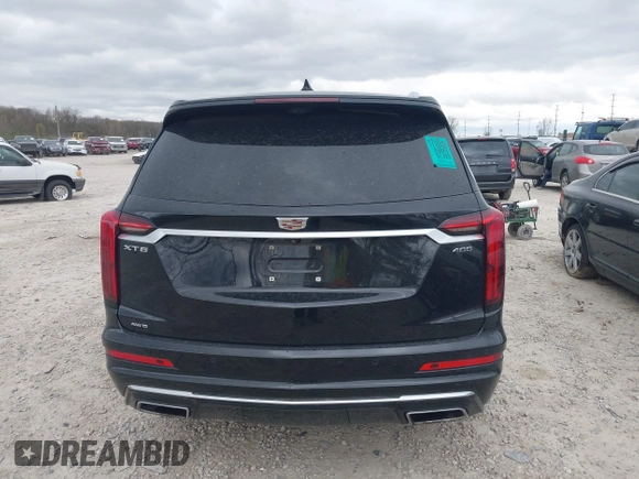 2021 Cadillac XT6 Premium Luxury with VIN 1GYKPDRS2MZ141406, listed as a IAAI auction lot 42014495 with 62,929 mi miles and . Bid and sale history available at DreamBid. Image 17.