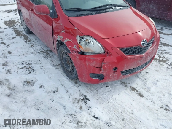 2009 Toyota Yaris with VIN JTDBT903991314767, listed as a IAAI auction lot 41615264 with 252,957 mi miles. Bid and sale history available at carsss.com. Image 6.