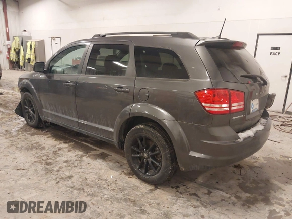 2020 Dodge Journey SE Value with VIN 3C4PDCAB7LT261279, listed as a IAAI auction lot 41564096 with 67,388 mi miles and . Bid and sale history available at DreamBid. Image 3.