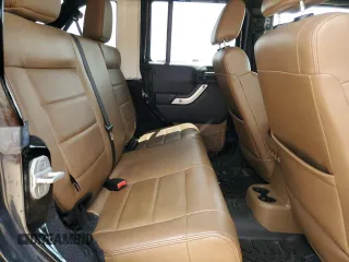 2012 Jeep Wrangler Unlimited Sahara z VIN 1C4HJWEG6CL141988, wystawiony jako Copart lot #61631115 z przebiegiem 140 401 mil mil oraz Szkoda całkowita • Salvage title. Historia ofert i sprzedaży dostępna na DreamBid. Obrazek 10.