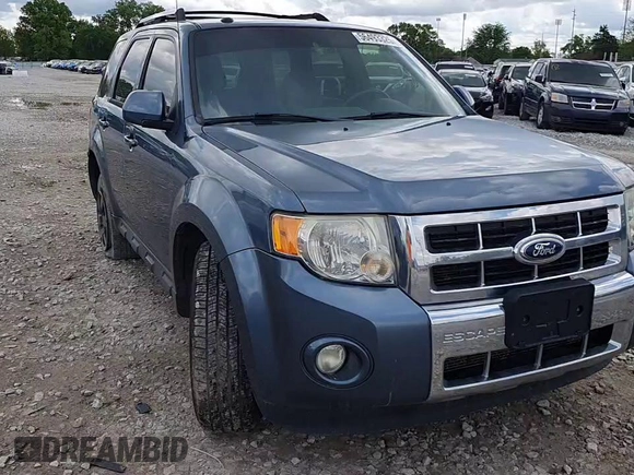 2011 Ford Escape Limited z VIN 1FMCU0E77BKC61667, wystawiony jako Copart lot #56493325 z przebiegiem 170 386 mil mil oraz Szkoda całkowita • Salvage title. Historia ofert i sprzedaży dostępna na DreamBid. Obrazek 14.