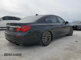2015 BMW 7 Series 740i with VIN WBAYA6C50FD826727, listed as a Copart auction lot 82197433 with 241,799 mi miles and . Bid and sale history available at DreamBid. Image 3.