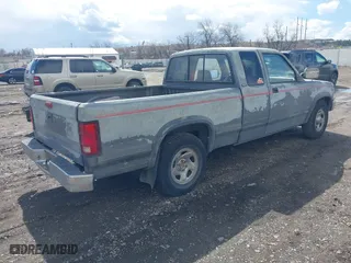 1995 Dodge Dakota with VIN 1B7GL23X4SS283696, listed as a IAAI auction lot 41915325 with 305,457 mi miles. Bid and sale history available at carsss.com. Image 4.