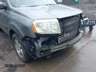2009 Honda Pilot EX-L with VIN 5FNYF48669B033858, listed as a IAAI auction lot 41918525 with 161,605 mi miles and . Bid and sale history available at carsss.com. Image 15.