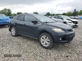 2007 Mazda CX-7 Touring z VIN JM3ER293370140808, wystawiony jako Copart lot #58067305 z przebiegiem 183 923 mil mil oraz Szkoda całkowita • Salvage title. Historia ofert i sprzedaży dostępna na DreamBid. Obrazek 4.
