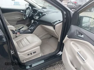2016 Ford Escape Titanium with VIN 1FMCU9J93GUB93729, listed as a IAAI auction lot 42177294 with 158,859 mi miles and . Bid and sale history available at DreamBid. Image 5.