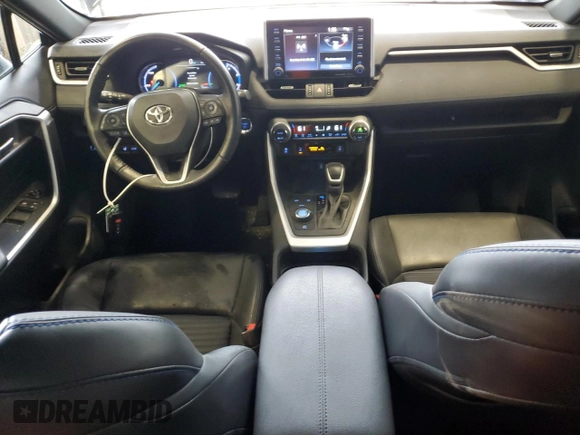 2021 Toyota RAV4 Hybrid XSE with VIN 2T3E6RFV7MW009954, listed as a Copart auction lot 54954425 with 61,397 mi miles and Salvage title. Bid and sale history available at DreamBid. Image 8.