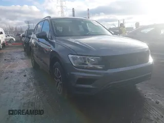 2021 Volkswagen Tiguan S with VIN 3VV1B7AX9MM075450, listed as a IAAI auction lot 41509295 with 69,097 mi miles and . Bid and sale history available at DreamBid. Image 1.