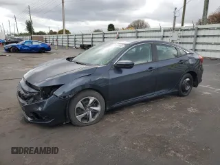2021 Honda Civic LX z VIN 2HGFC2F69MH502002, wystawiony jako Copart lot #52882605 z przebiegiem Nie podano mil oraz Szkoda całkowita • Salvage title. Historia ofert i sprzedaży dostępna na DreamBid. Obrazek 1.
