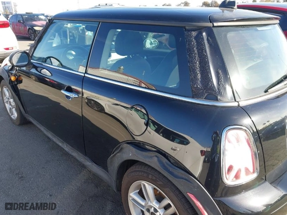 2011 MINI Cooper Hardtop with VIN WMWSU3C56BT093420, listed as a IAAI auction lot 41704260 with 142,408 mi miles. Bid and sale history available at carsss.com. Image 6.