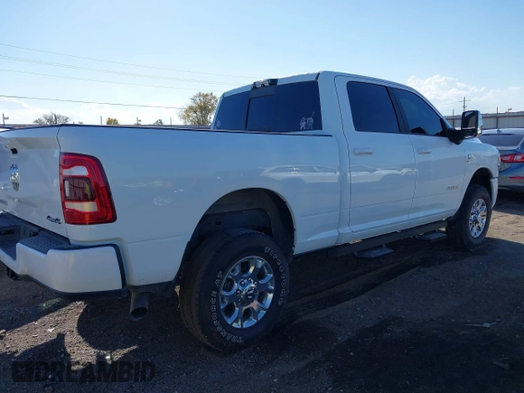 2024 Ram 2500 Laramie with VIN 3C6UR5FL4RG195798, listed as a IAAI auction lot 40654451 with 9,696 mi miles. Bid and sale history available at carsss.com. Image 4.