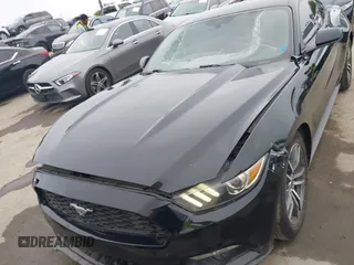 2016 Ford Mustang EcoBoost z VIN 1FA6P8TH0G5237709, wystawiony jako IAAI lot #42100996 z przebiegiem 81 096 mil mil oraz . Historia ofert i sprzedaży dostępna na DreamBid. Obrazek 6.