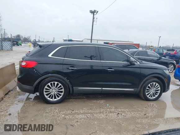 2016 Lincoln MKX Select with VIN 2LMTJ6KRXGBL50561, listed as a IAAI auction lot 41941507 with 81,230 mi miles. Bid and sale history available at carsss.com. Image 14.