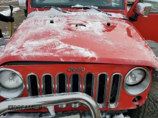 2015 Jeep Wrangler Unlimited Sport z VIN 1C4BJWDG9FL761049, wystawiony jako Copart lot #44188715 z przebiegiem 156 345 mil mil oraz Nie do naprawy • Non repairable. Historia ofert i sprzedaży dostępna na DreamBid. Obrazek 13.