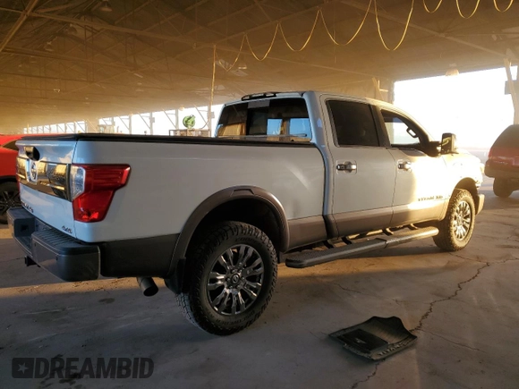 2016 Nissan Titan XD Platinum Reserve with VIN 1N6BA1F42GN512715, listed as a Copart auction lot 88910205 with 85,364 mi miles and Salvage Title. Bid and sale history available at carsss.com. Image 3.