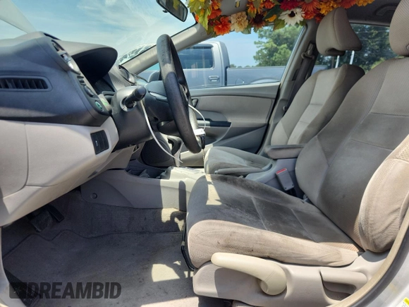 2011 Honda Insight LX z VIN JHMZE2H56BS009537, wystawiony jako Copart lot #62281105 z przebiegiem 240 131 mil mil oraz Szkoda całkowita • Salvage title. Historia ofert i sprzedaży dostępna na DreamBid. Obrazek 7.