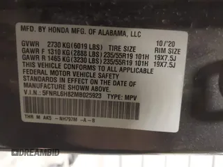 2021 Honda Odyssey Touring with VIN 5FNRL6H82MB025923, listed as a IAAI auction lot 42104290 with 61,178 mi miles and . Bid and sale history available at DreamBid. Image 9.