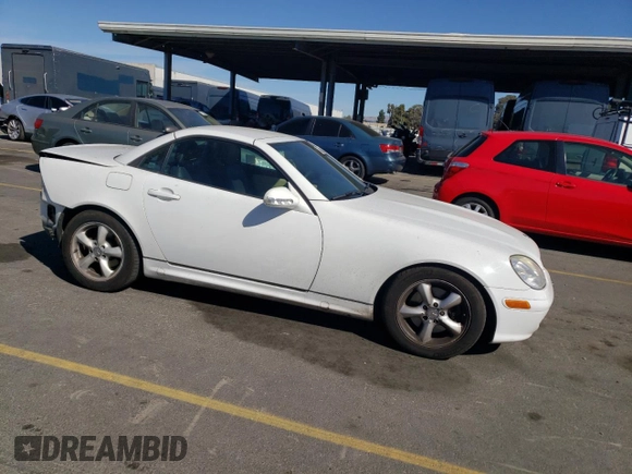 2001 Mercedes-Benz SLK 230/320 with VIN WDBKK65F41F235419, listed as a Copart auction lot 77407374 with 79,238 mi miles and Salvage Title. Bid and sale history available at DreamBid. Image 4.