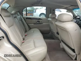 2001 Lincoln Town Car Cartier L z VIN 1LNHM85W61Y640344, wystawiony jako Copart lot #74755564 z przebiegiem Nie podano mil oraz Szkoda całkowita • Salvage title. Historia ofert i sprzedaży dostępna na DreamBid. Obrazek 10.