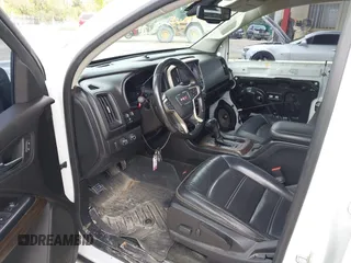2018 GMC Canyon 4WD Denali with VIN 1GTP6EE16J1171424, listed as a IAAI auction lot 41397106 with 105,922 mi miles. Bid and sale history available at carsss.com. Image 5.