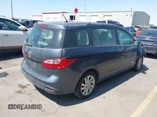2012 Mazda 5 Sport with VIN JM1CW2BL1C0116150, listed as a IAAI auction lot 42571812 with 124,236 mi miles and . Bid and sale history available at DreamBid. Image 4.