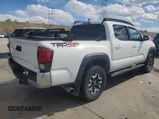 2018 Toyota Tacoma SR with VIN 5TFCZ5AN3JX128204, listed as a Copart auction lot 53970865 with 76,986 mi miles and Salvage Title. Bid and sale history available at DreamBid. Image 3.