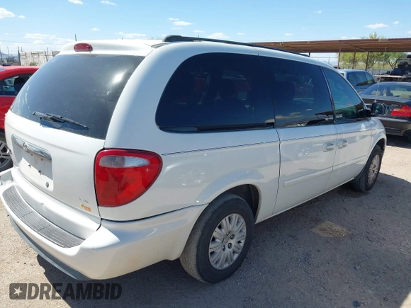 2005 Chrysler Town & Country LX with VIN 2C4GP44R75R213048, listed as a IAAI auction lot 42068985 with 100,688 mi miles and . Bid and sale history available at DreamBid. Image 4.